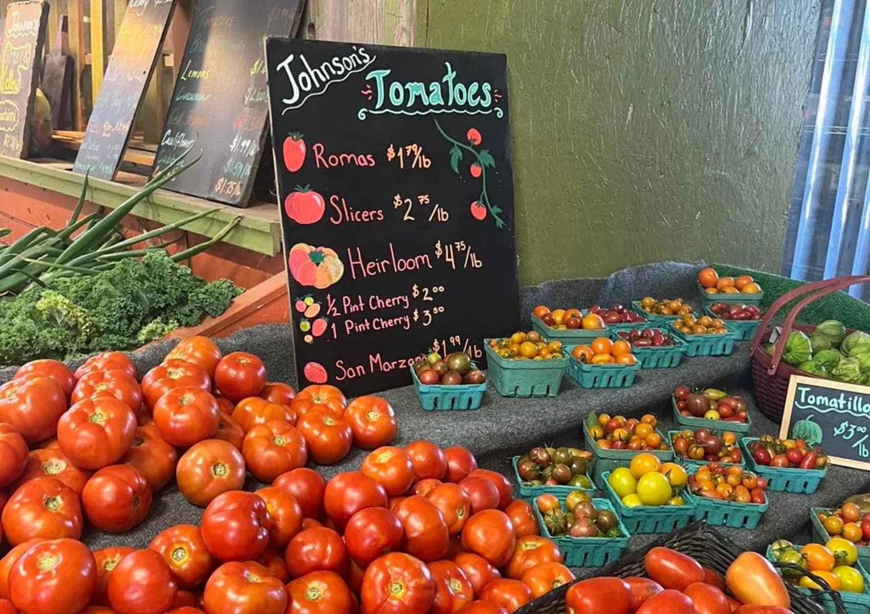 Fresh tomatoes displayed at the farm store.